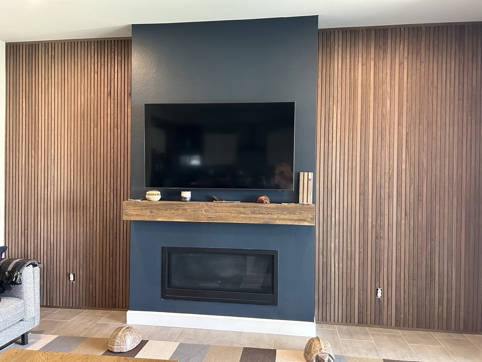 Fireplace feature wall with wood slat panels